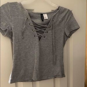 gray crop top with criss cross front